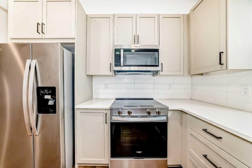 86 Heirloom Passage Se, Calgary, AB - Indoor Photo Showing Kitchen