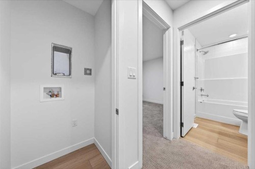 90 Heirloom Passage Se, Calgary, AB - Indoor Photo Showing Other Room