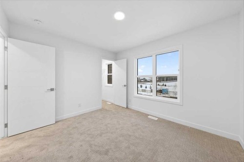90 Heirloom Passage Se, Calgary, AB - Indoor Photo Showing Other Room