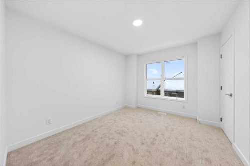 90 Heirloom Passage Se, Calgary, AB - Indoor Photo Showing Other Room