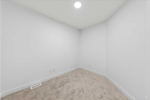 90 Heirloom Passage Se, Calgary, AB - Indoor Photo Showing Other Room