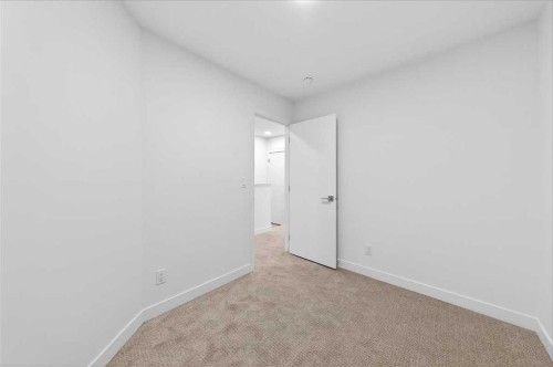 90 Heirloom Passage Se, Calgary, AB - Indoor Photo Showing Other Room