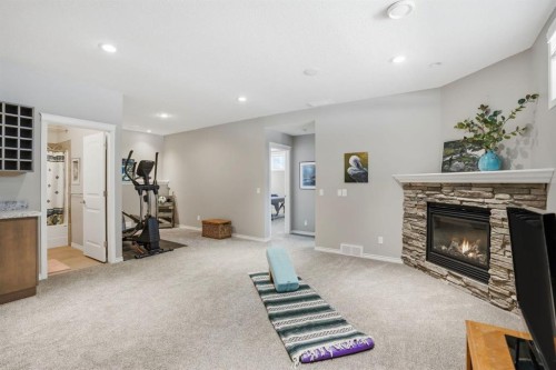 138 Reunion Landing, Airdrie, AB - Indoor With Fireplace