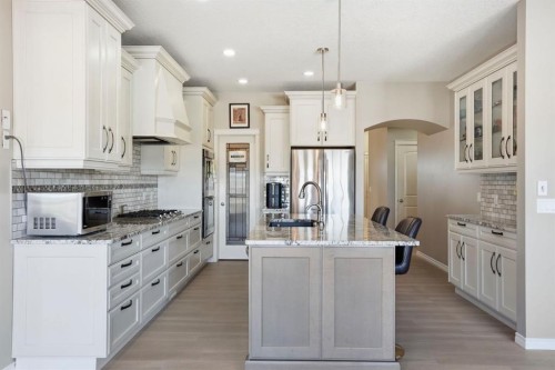 138 Reunion Landing, Airdrie, AB - Indoor Photo Showing Kitchen With Upgraded Kitchen