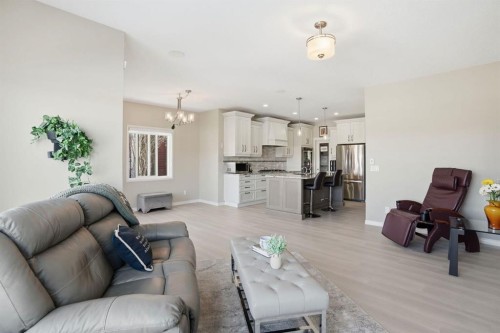 138 Reunion Landing, Airdrie, AB - Indoor Photo Showing Living Room