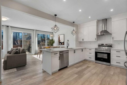 20 Rowley Common Nw, Calgary, AB - Indoor Photo Showing Kitchen With Upgraded Kitchen