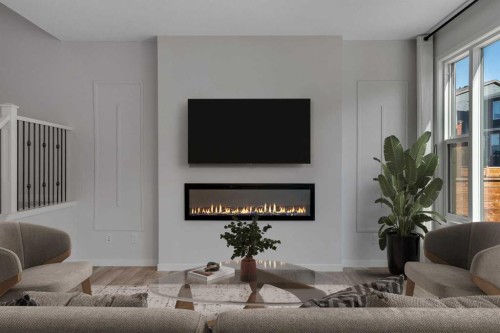 20 Rowley Common Nw, Calgary, AB - Indoor Photo Showing Living Room With Fireplace