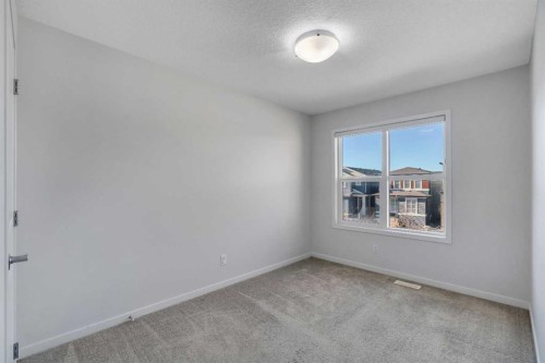 20 Rowley Common Nw, Calgary, AB - Indoor Photo Showing Other Room