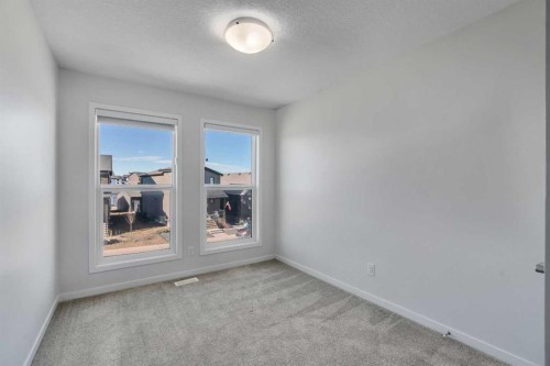 20 Rowley Common Nw, Calgary, AB - Indoor Photo Showing Other Room