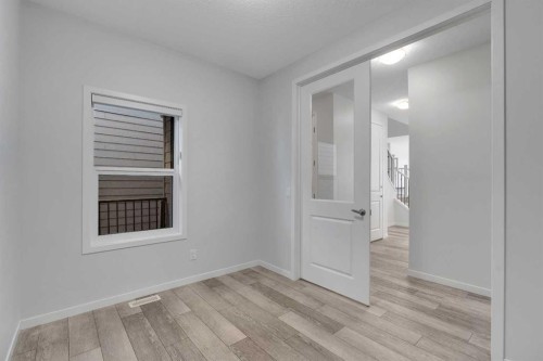 20 Rowley Common Nw, Calgary, AB - Indoor Photo Showing Other Room