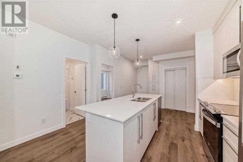2409-395 Skyview Parkway Ne, Calgary, AB - Indoor Photo Showing Kitchen With Double Sink