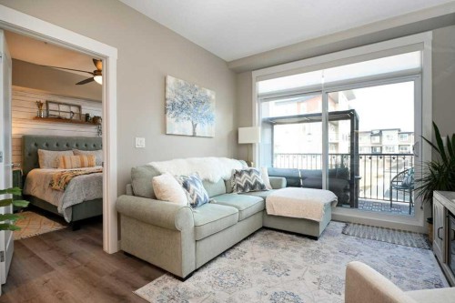 210-20 Walgrove Walk Se, Calgary, AB - Indoor Photo Showing Living Room