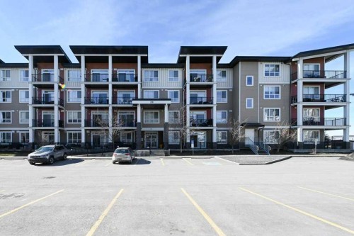 210-20 Walgrove Walk Se, Calgary, AB - Outdoor With Balcony With Facade