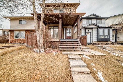5 Templeby Way Ne, Calgary, AB - Outdoor With Deck Patio Veranda With Facade