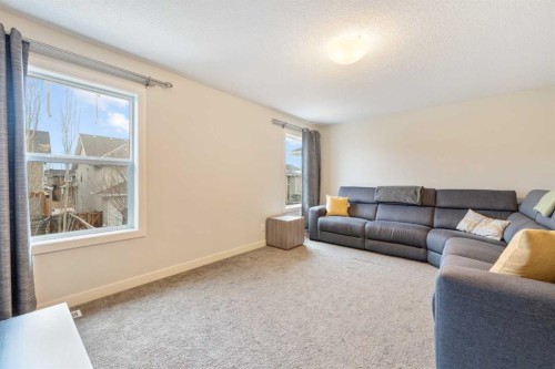 150 Auburn Springs Boulevard Se, Calgary, AB - Indoor Photo Showing Living Room