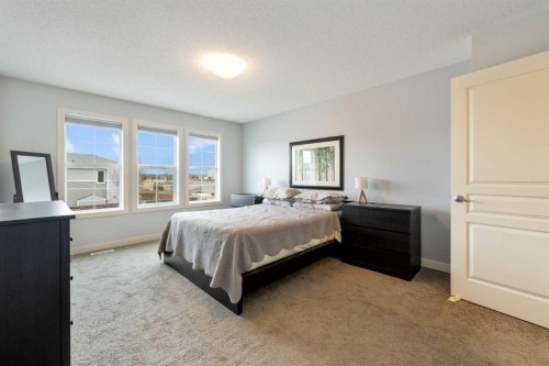 150 Auburn Springs Boulevard Se, Calgary, AB - Indoor Photo Showing Bedroom