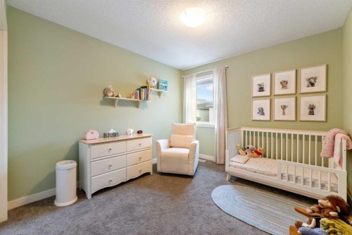 150 Auburn Springs Boulevard Se, Calgary, AB - Indoor Photo Showing Bedroom