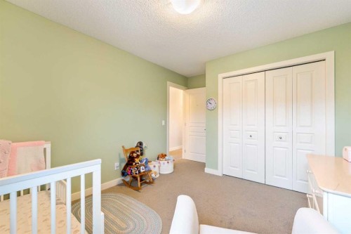 150 Auburn Springs Boulevard Se, Calgary, AB - Indoor Photo Showing Bedroom