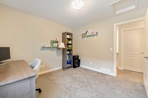 150 Auburn Springs Boulevard Se, Calgary, AB - Indoor Photo Showing Other Room