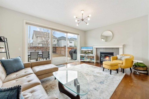 150 Auburn Springs Boulevard Se, Calgary, AB - Indoor Photo Showing Living Room With Fireplace