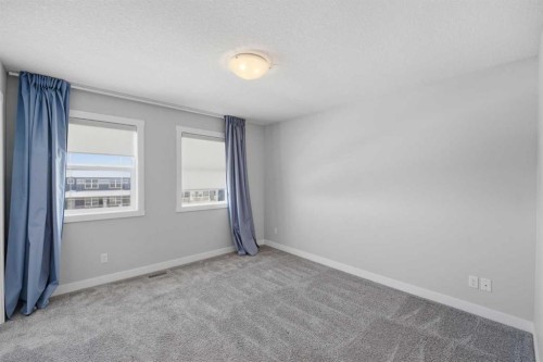 125 Edith Gate Nw, Calgary, AB - Indoor Photo Showing Other Room