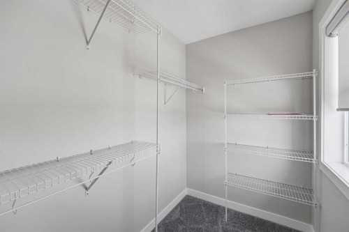 125 Edith Gate Nw, Calgary, AB - Indoor With Storage