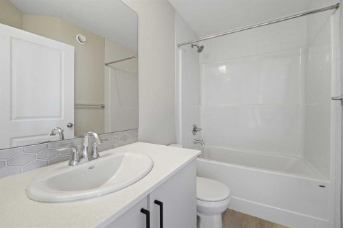 125 Edith Gate Nw, Calgary, AB - Indoor Photo Showing Bathroom