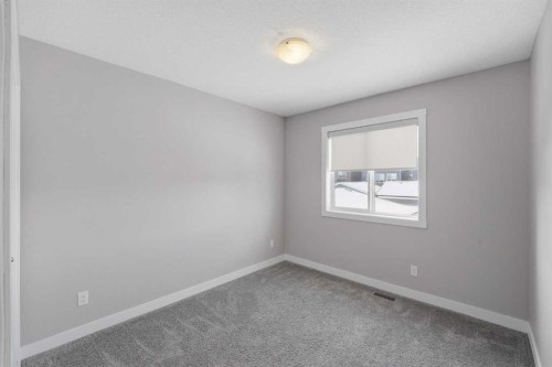 125 Edith Gate Nw, Calgary, AB - Indoor Photo Showing Other Room