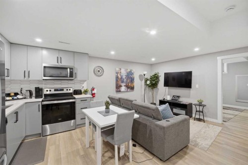 125 Edith Gate Nw, Calgary, AB - Indoor Photo Showing Kitchen With Stainless Steel Kitchen