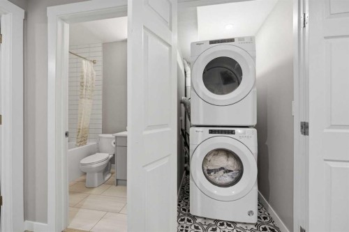 125 Edith Gate Nw, Calgary, AB - Indoor Photo Showing Laundry Room