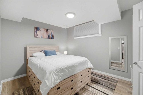 125 Edith Gate Nw, Calgary, AB - Indoor Photo Showing Bedroom