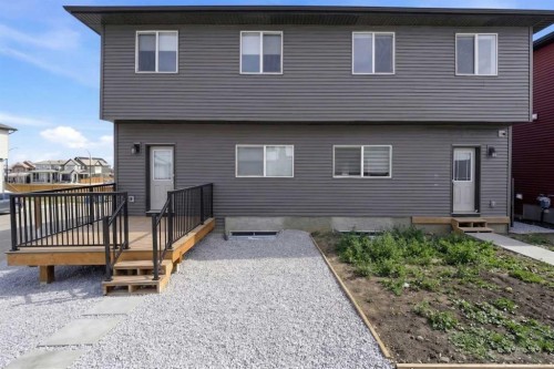 125 Edith Gate Nw, Calgary, AB - Outdoor With Exterior