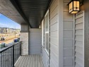 125 Edith Gate Nw, Calgary, AB  - Outdoor With Exterior 