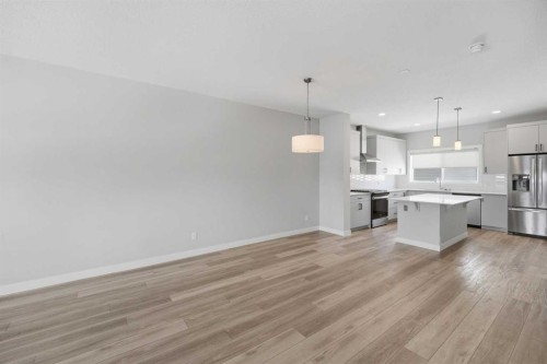 125 Edith Gate Nw, Calgary, AB - Indoor Photo Showing Kitchen With Stainless Steel Kitchen With Upgraded Kitchen