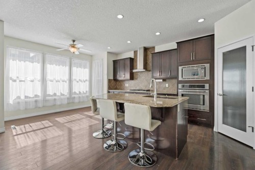 386 Mahogany Terrace Se, Calgary, AB - Indoor Photo Showing Living Room With Fireplace