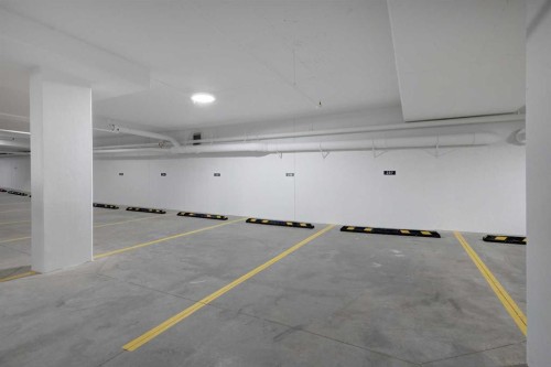 4304-111 Wolf Creek Drive Se, Calgary, AB - Indoor Photo Showing Garage