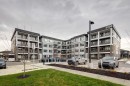4304-111 Wolf Creek Drive Se, Calgary, AB  - Outdoor With Balcony With Facade 