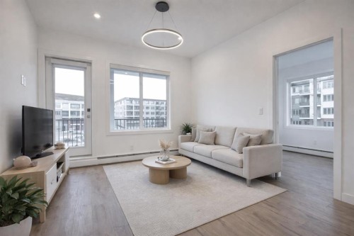 4304-111 Wolf Creek Drive Se, Calgary, AB - Indoor Photo Showing Living Room