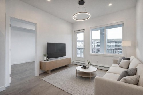 4304-111 Wolf Creek Drive Se, Calgary, AB - Indoor Photo Showing Living Room