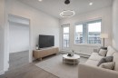 4304-111 Wolf Creek Drive Se, Calgary, AB  - Indoor Photo Showing Living Room 