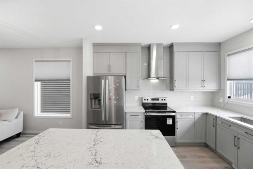 34 Aquila Way Nw, Calgary, AB - Indoor Photo Showing Kitchen With Stainless Steel Kitchen