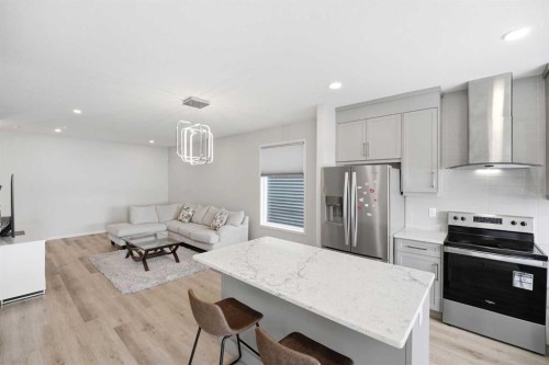 34 Aquila Way Nw, Calgary, AB - Indoor Photo Showing Kitchen With Stainless Steel Kitchen With Upgraded Kitchen