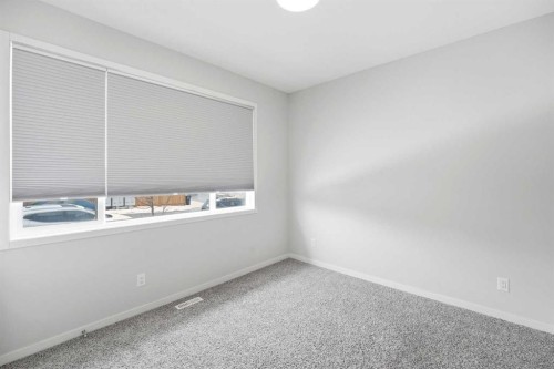 34 Aquila Way Nw, Calgary, AB - Indoor Photo Showing Other Room