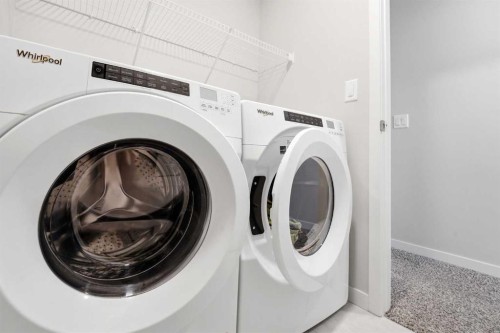 34 Aquila Way Nw, Calgary, AB - Indoor Photo Showing Laundry Room