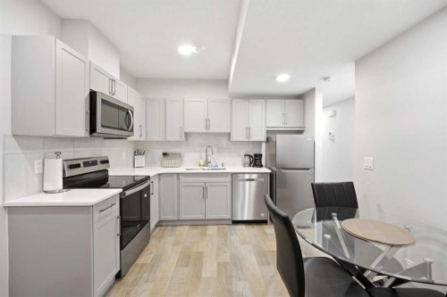 34 Aquila Way Nw, Calgary, AB - Indoor Photo Showing Kitchen With Stainless Steel Kitchen