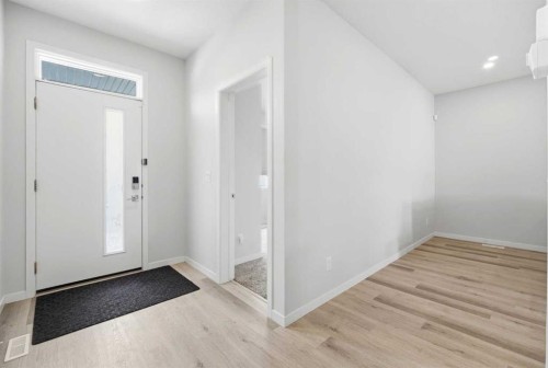 34 Aquila Way Nw, Calgary, AB - Indoor Photo Showing Other Room
