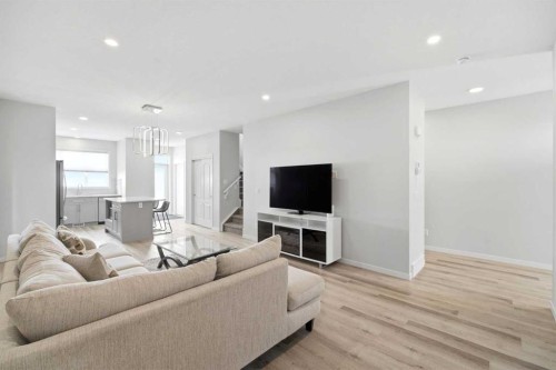 34 Aquila Way Nw, Calgary, AB - Indoor Photo Showing Living Room