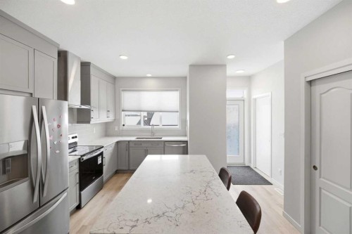 34 Aquila Way Nw, Calgary, AB - Indoor Photo Showing Kitchen With Stainless Steel Kitchen