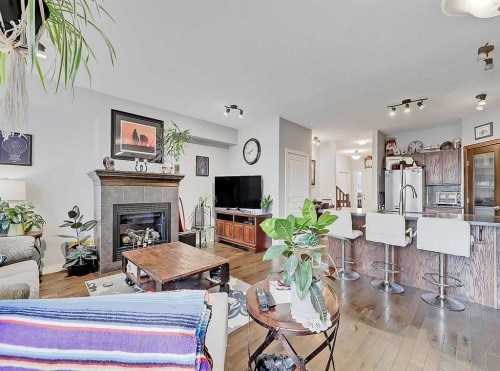 32-351 Monteith Drive Se, High River, AB - Indoor Photo Showing Living Room With Fireplace