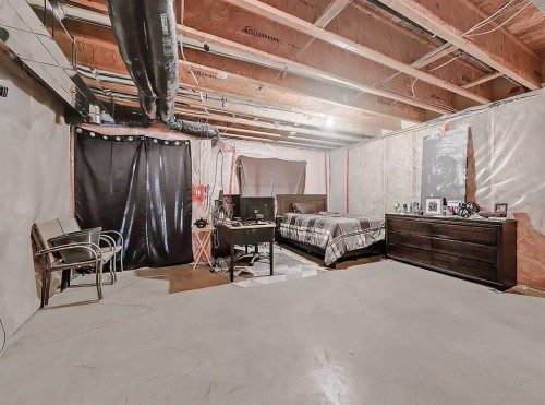 32-351 Monteith Drive Se, High River, AB - Indoor Photo Showing Basement